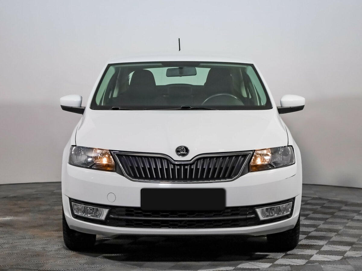 Skoda Rapid с пробегом — 2015 год. Фото: #1