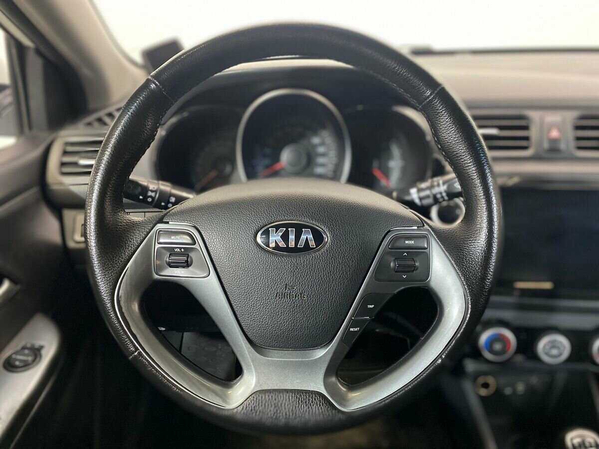Kia Rio с пробегом — 2015 год. Фото: #11