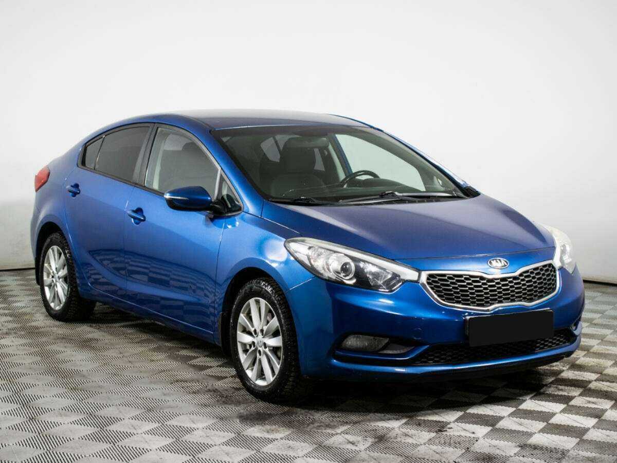 Kia Cerato с пробегом — 2014 год. Фото: #2