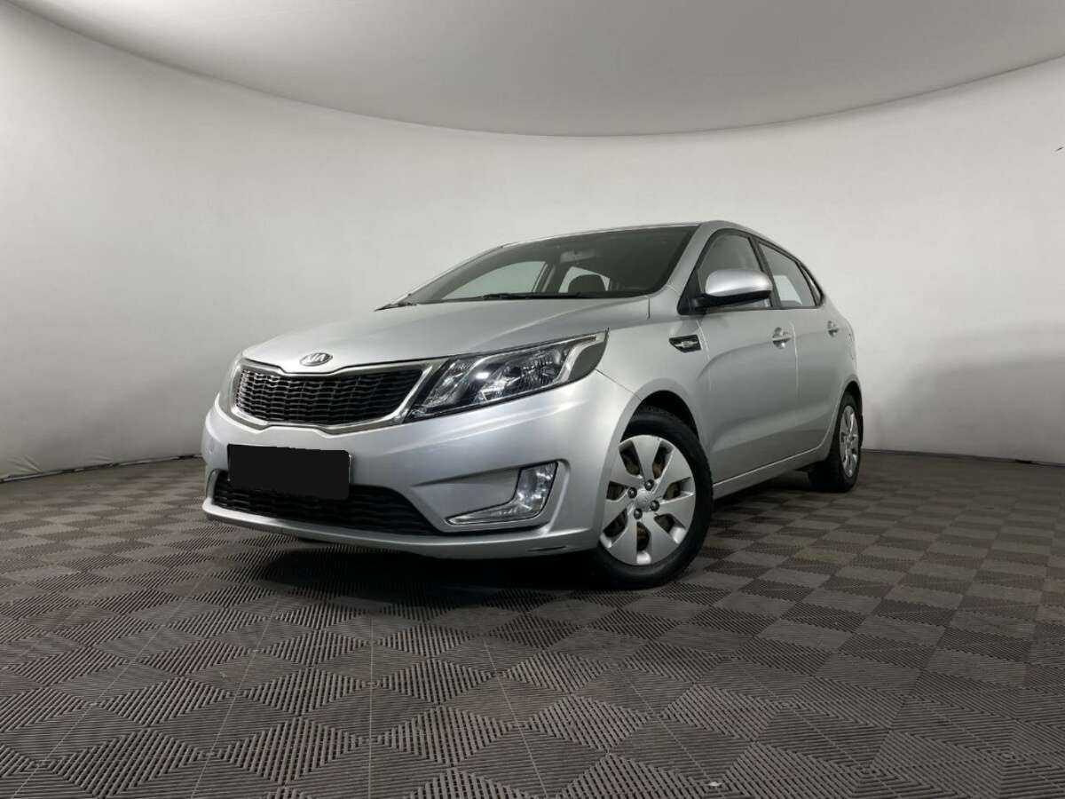 Kia Rio с пробегом — 2013 год. Фото: #0