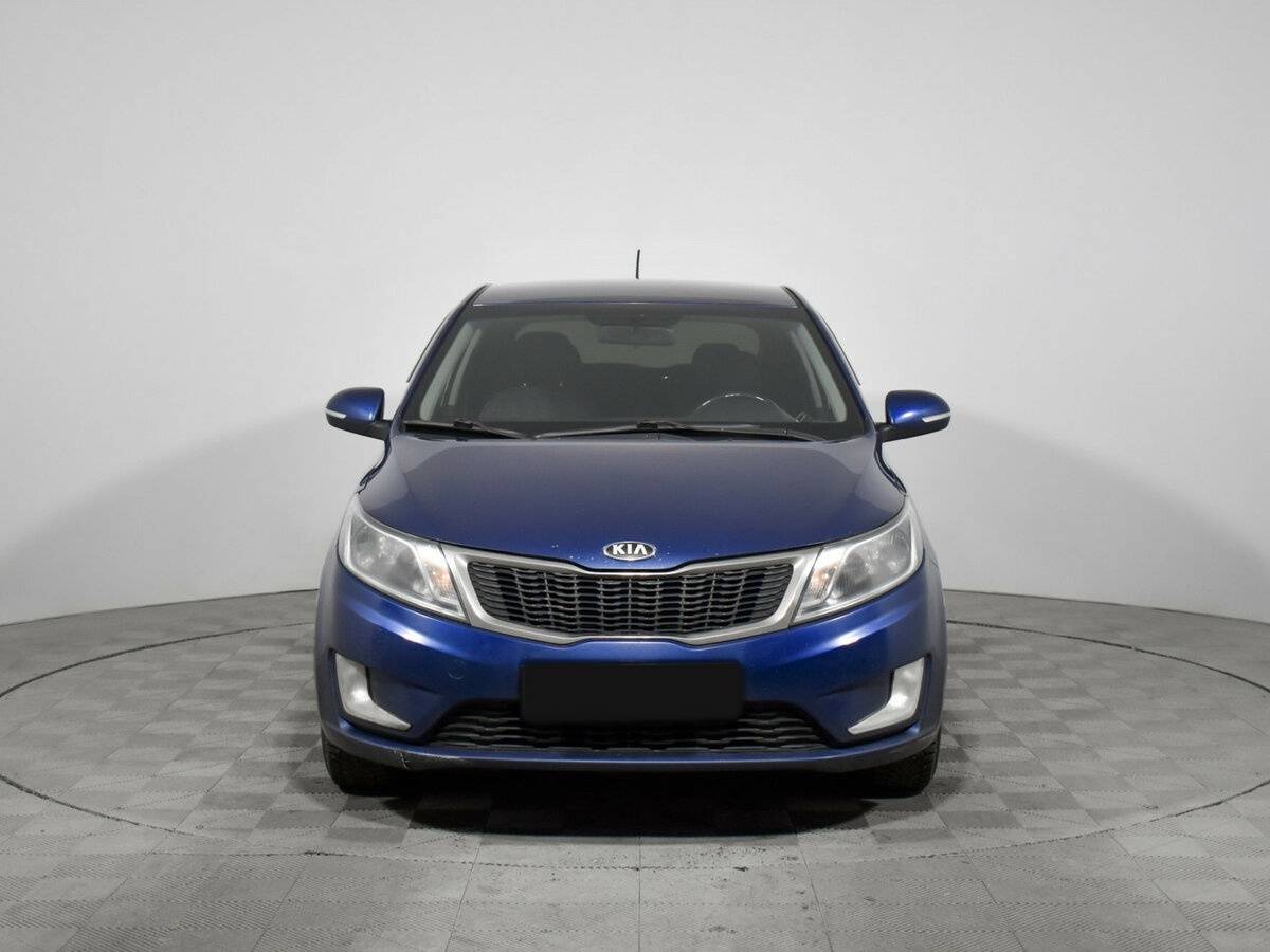 Kia Rio с пробегом — 2014 год. Фото: #1