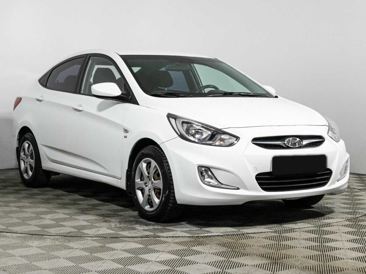 Hyundai Solaris с пробегом — 2013 год. Фото: #2
