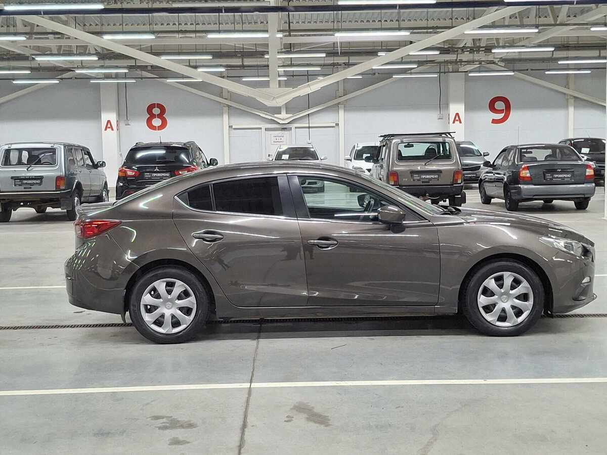 Mazda 3 с пробегом — 2014 год. Фото: #3