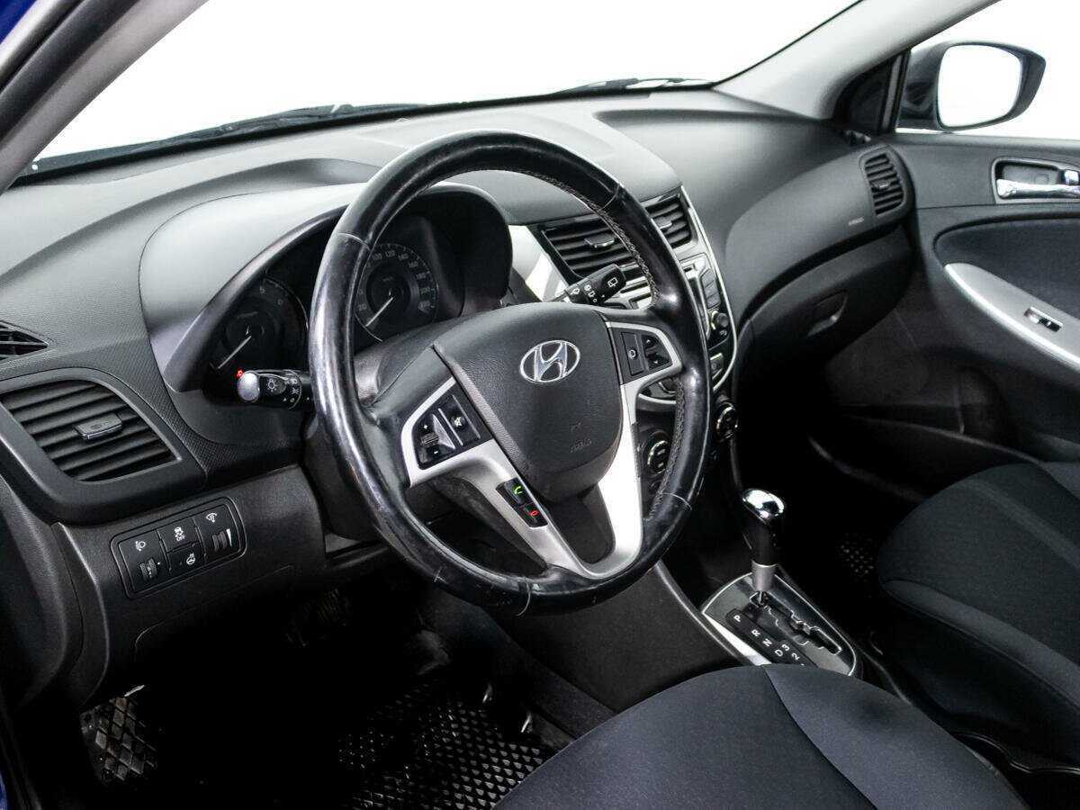 Hyundai Solaris с пробегом — 2013 год. Фото: #10
