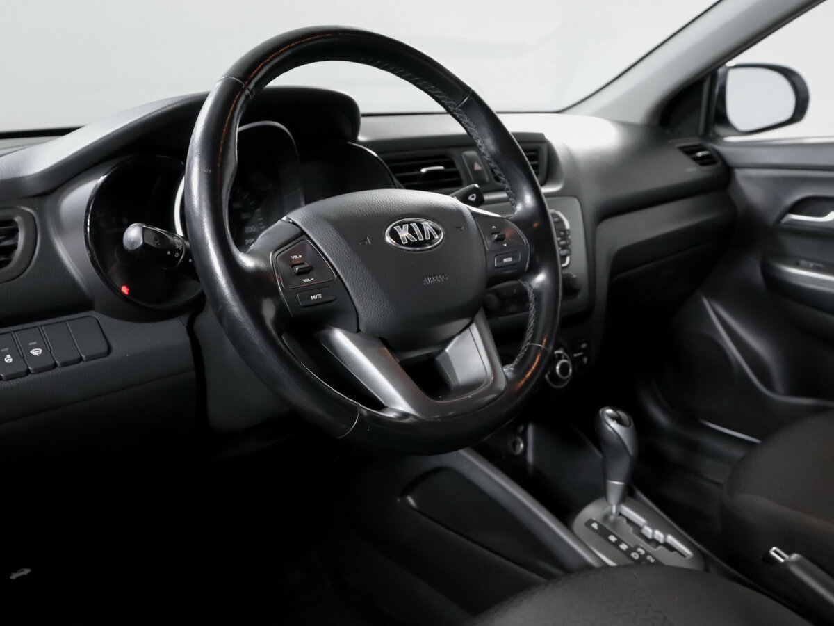 Kia Rio с пробегом — 2014 год. Фото: #10