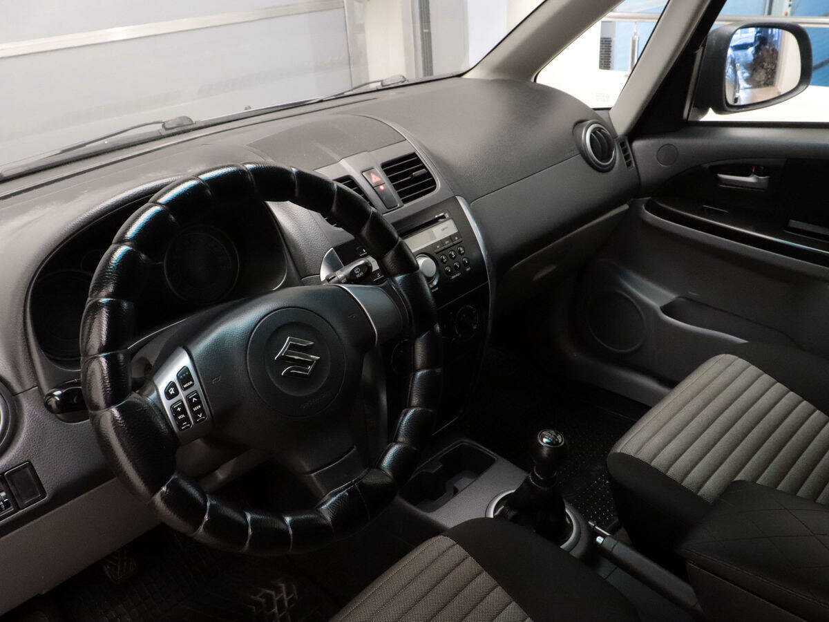Suzuki SX4 с пробегом — 2012 год. Фото: #8