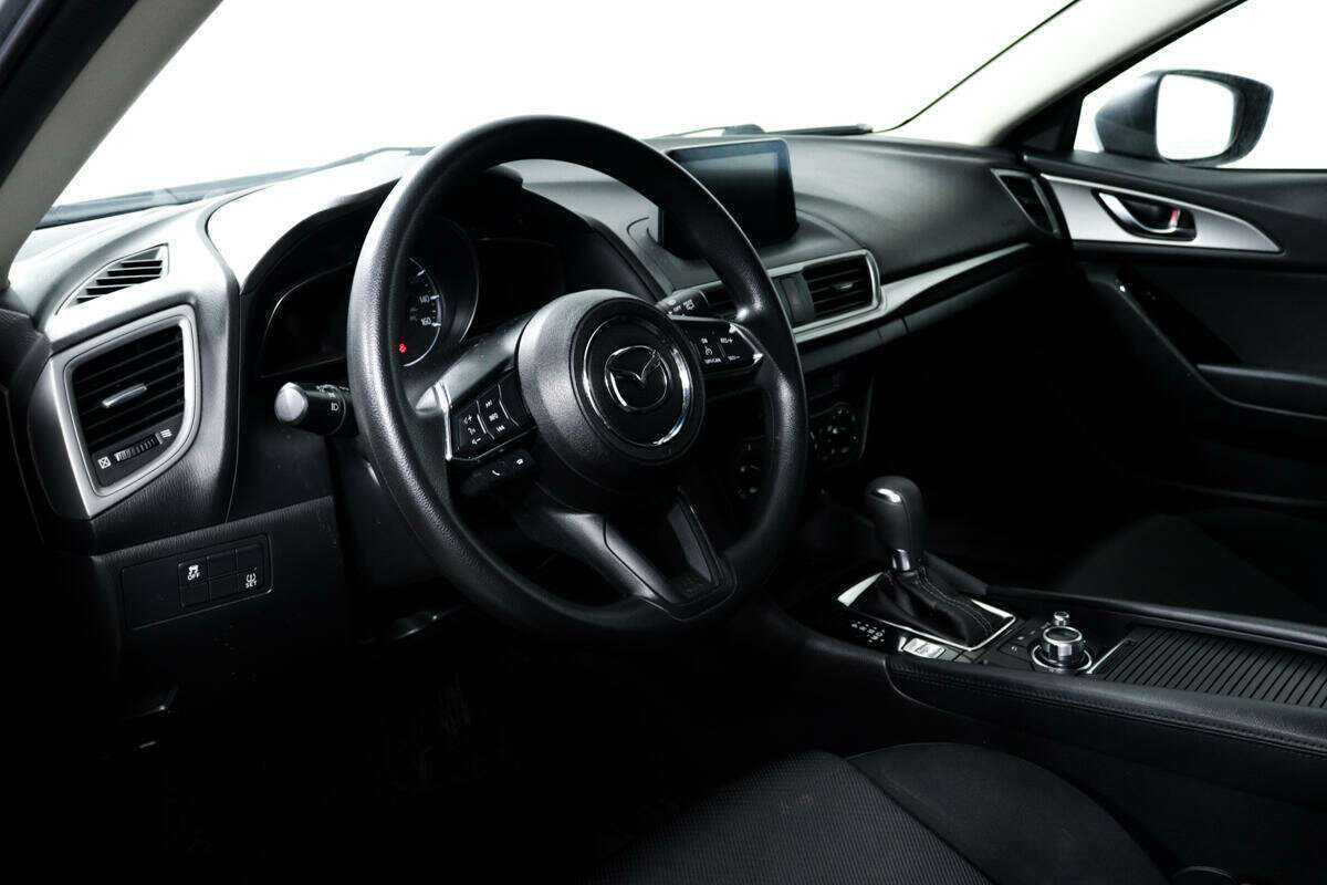 Mazda 3 с пробегом — 2016 год. Фото: #12