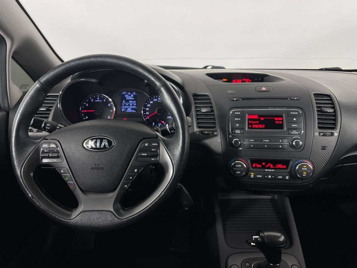 Kia Cerato с пробегом — 2014 год. Фото: #9