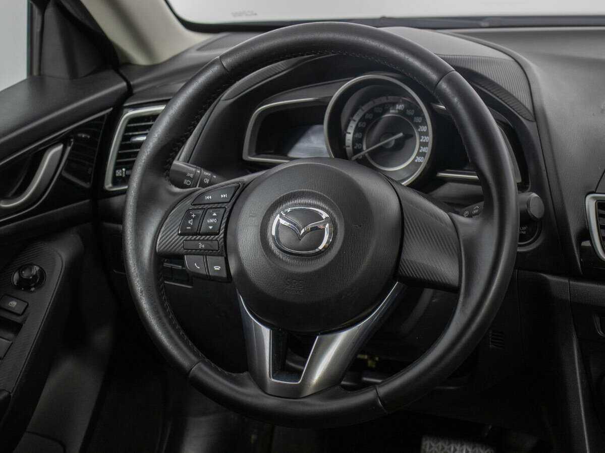 Mazda 3 с пробегом — 2014 год. Фото: #14