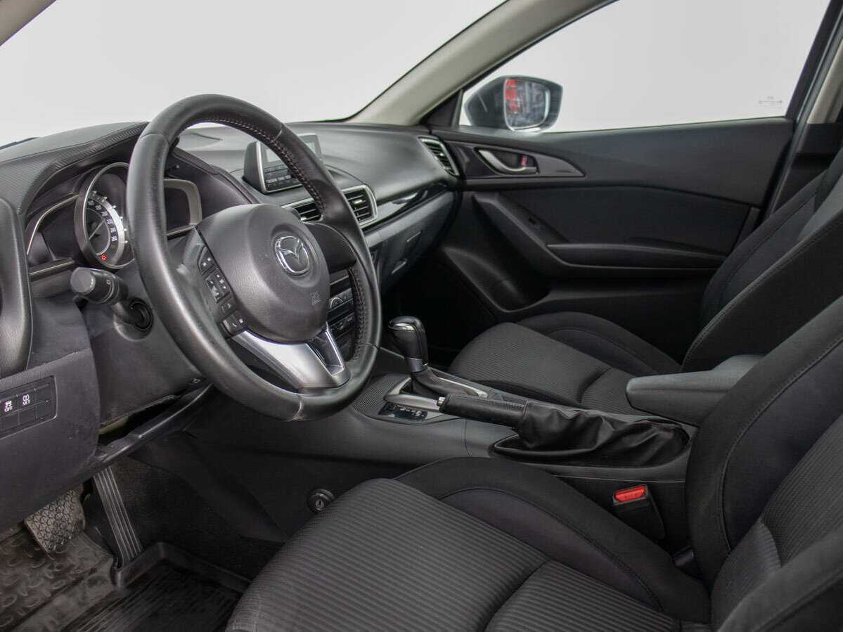 Mazda 3 с пробегом — 2014 год. Фото: #9