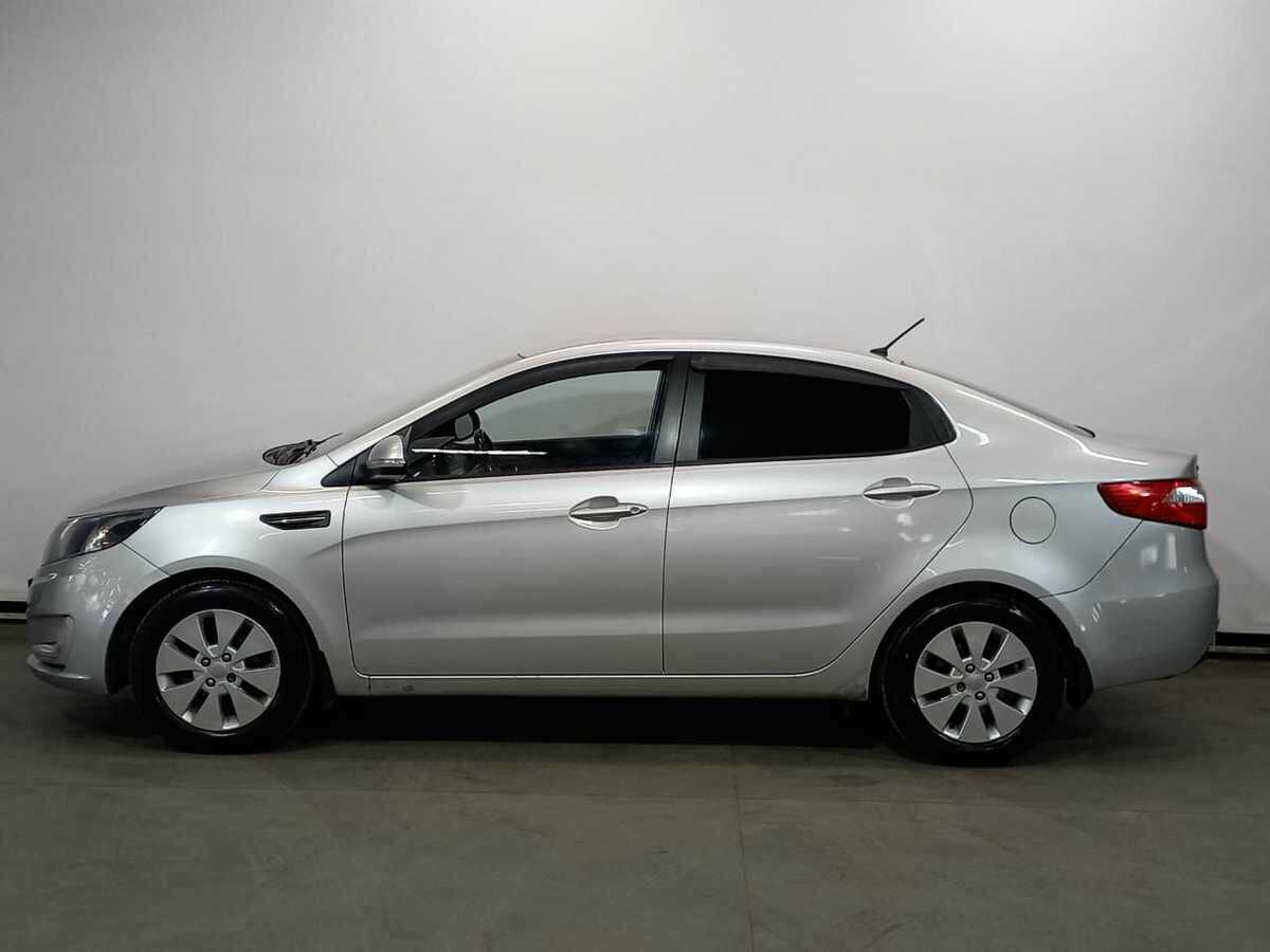 Kia Rio с пробегом — 2013 год. Фото: #7
