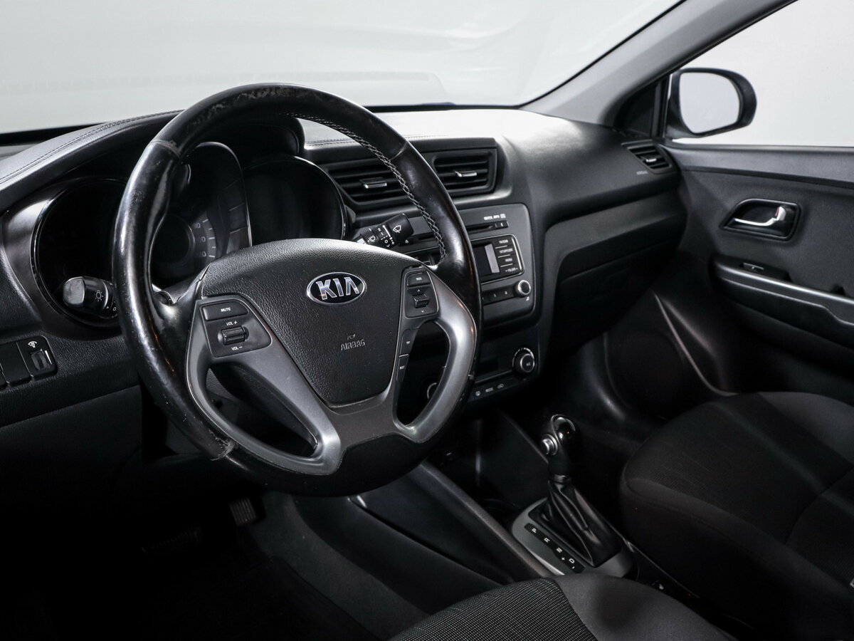 Kia Rio с пробегом — 2015 год. Фото: #10