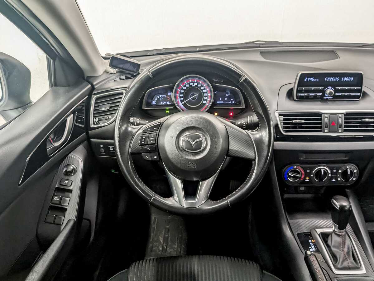 Mazda 3 с пробегом — 2014 год. Фото: #20
