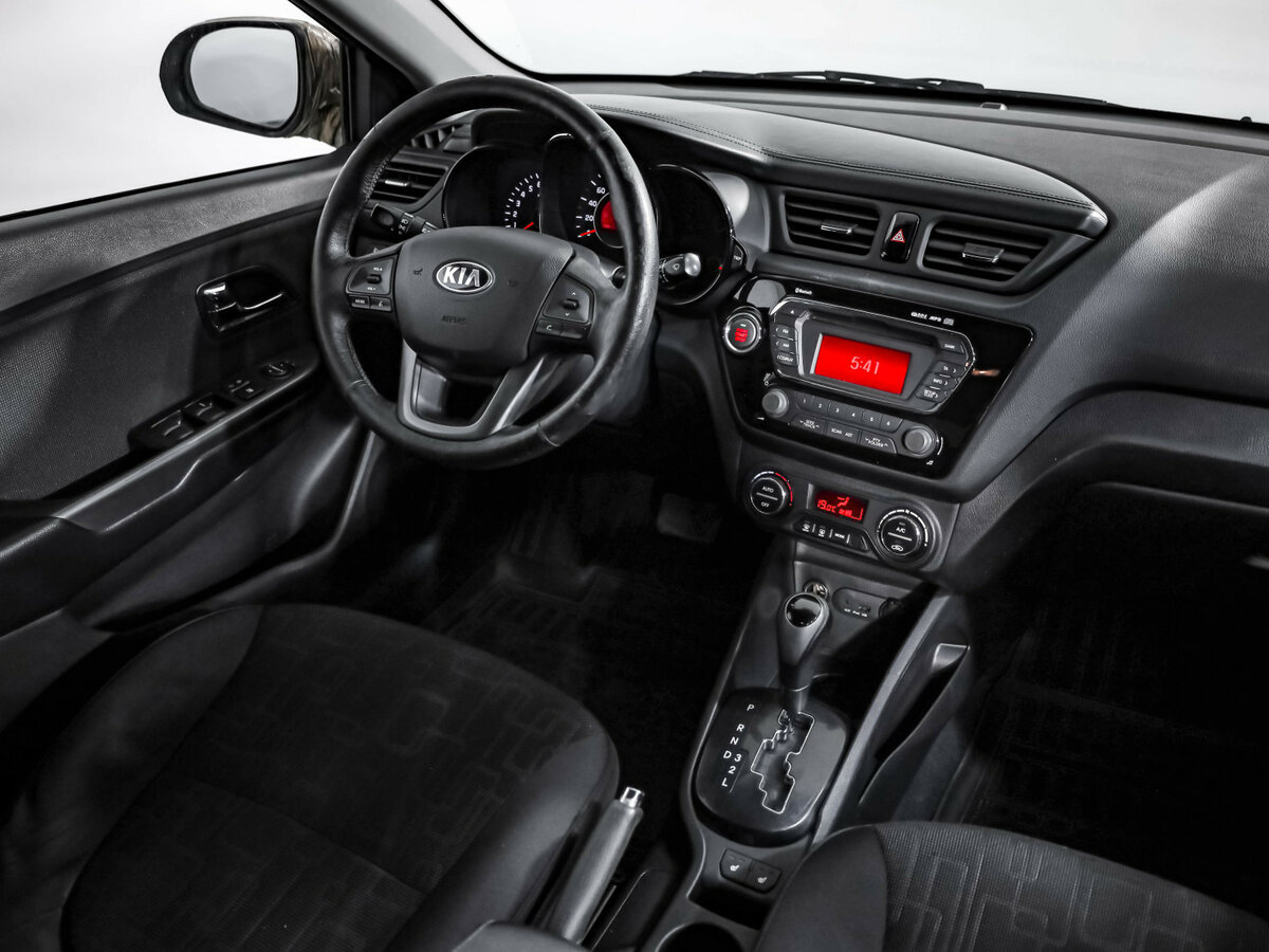 Kia Rio с пробегом — 2013 год. Фото: #5