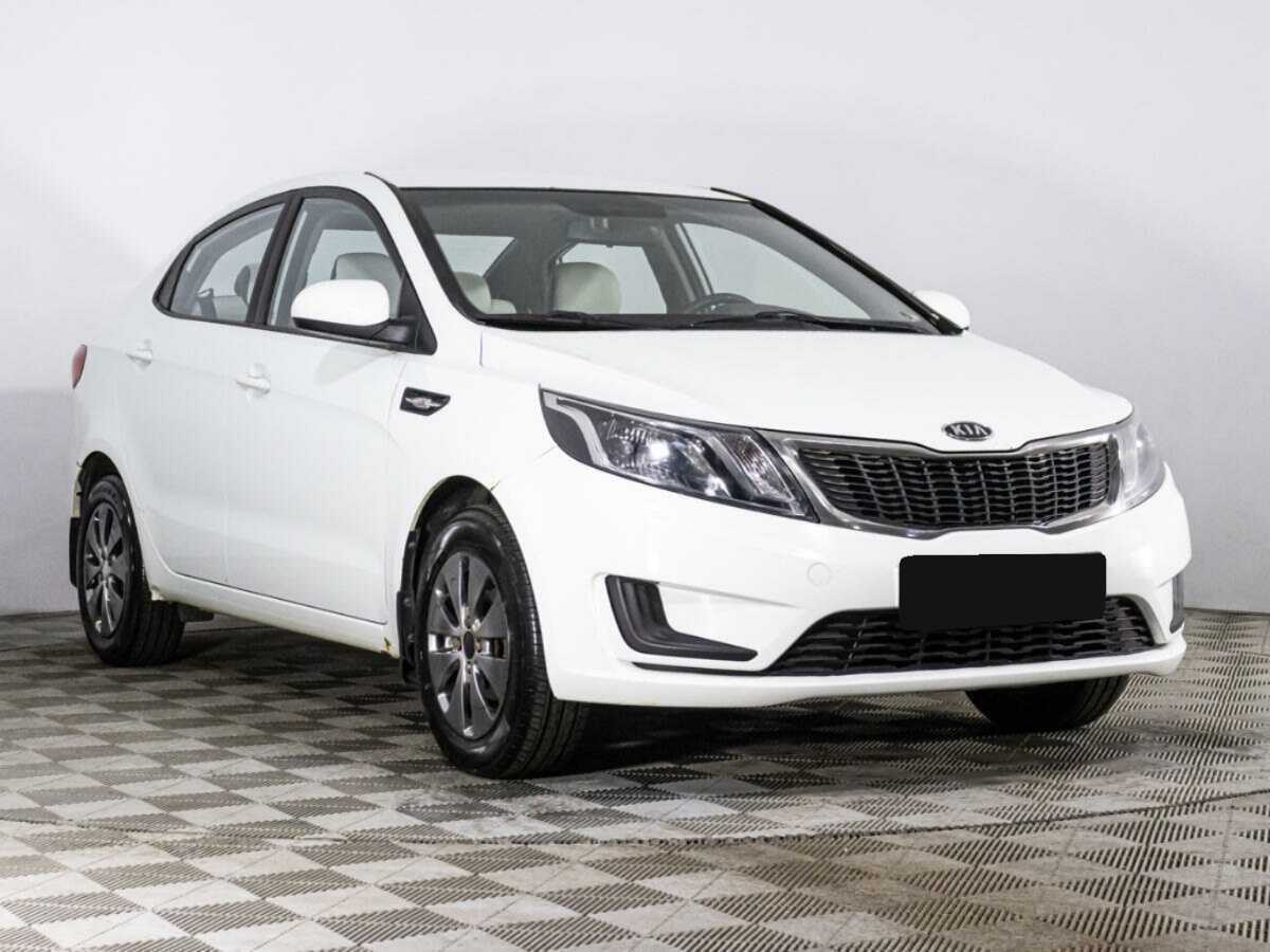 Kia Rio с пробегом — 2012 год. Фото: #2