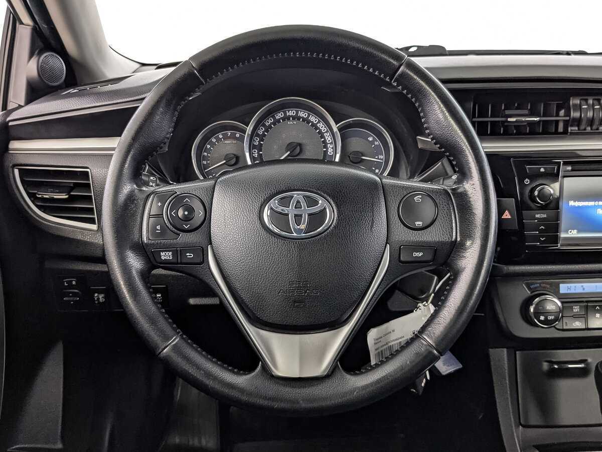 Toyota Corolla с пробегом — 2014 год. Фото: #19