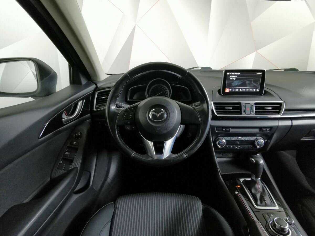 Mazda 3 с пробегом — 2014 год. Фото: #14