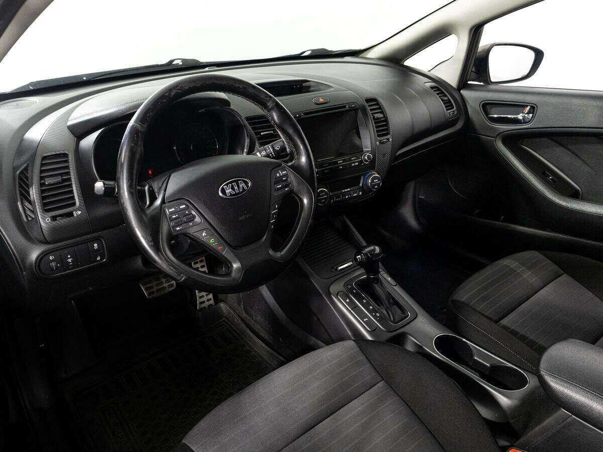 Kia Cerato с пробегом — 2014 год. Фото: #10