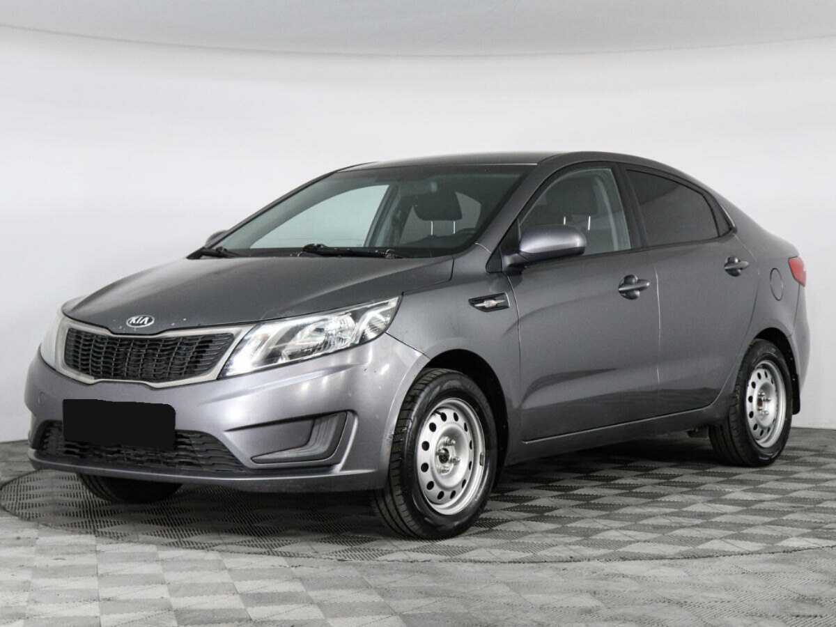 Kia Rio с пробегом — 2014 год. Фото: #0