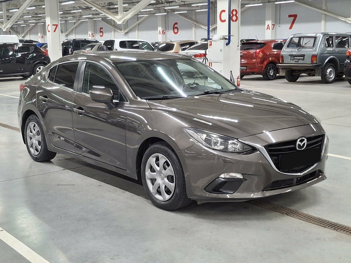 Mazda 3 с пробегом — 2014 год. Фото: #2