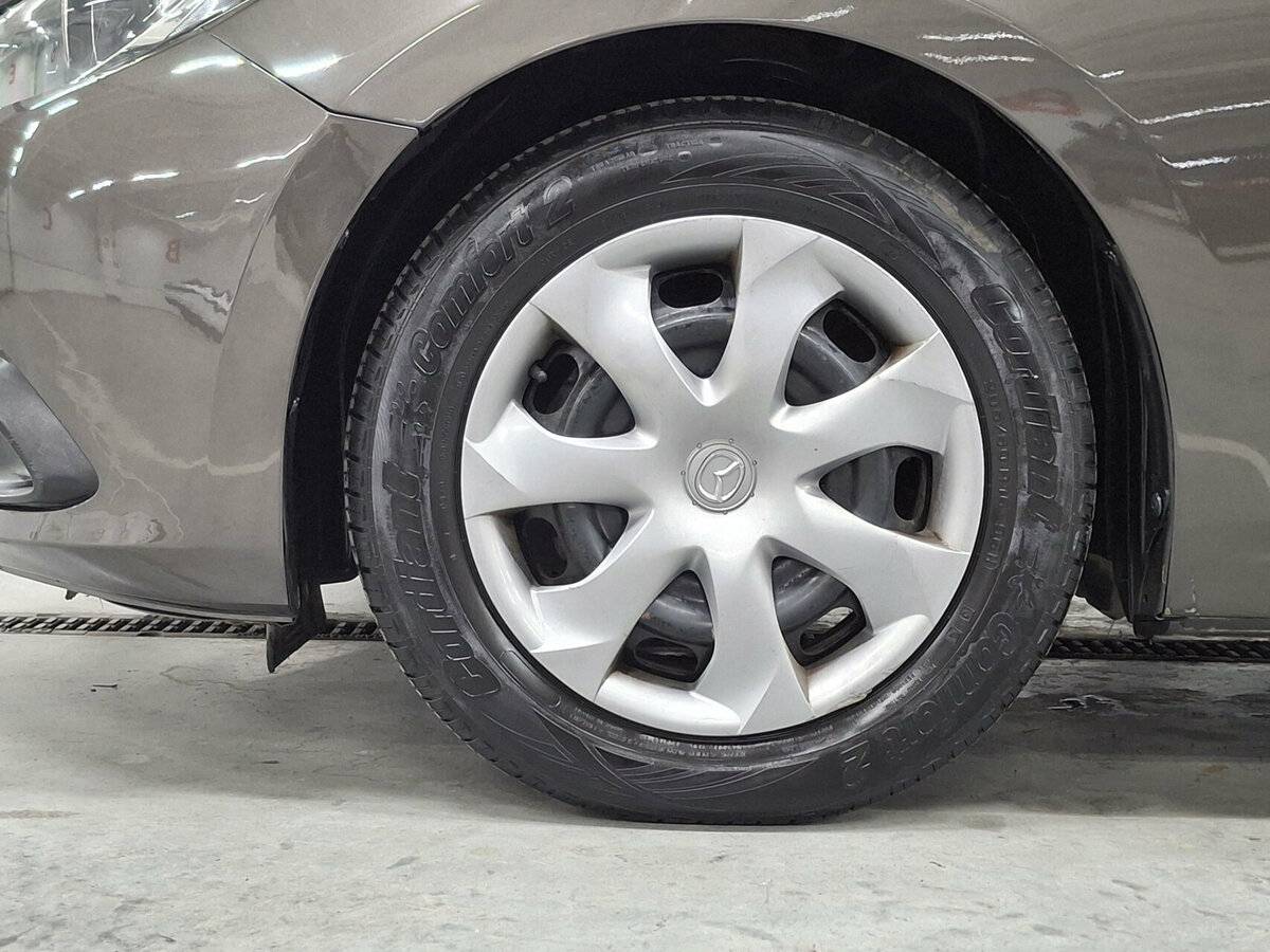 Mazda 3 с пробегом — 2014 год. Фото: #16