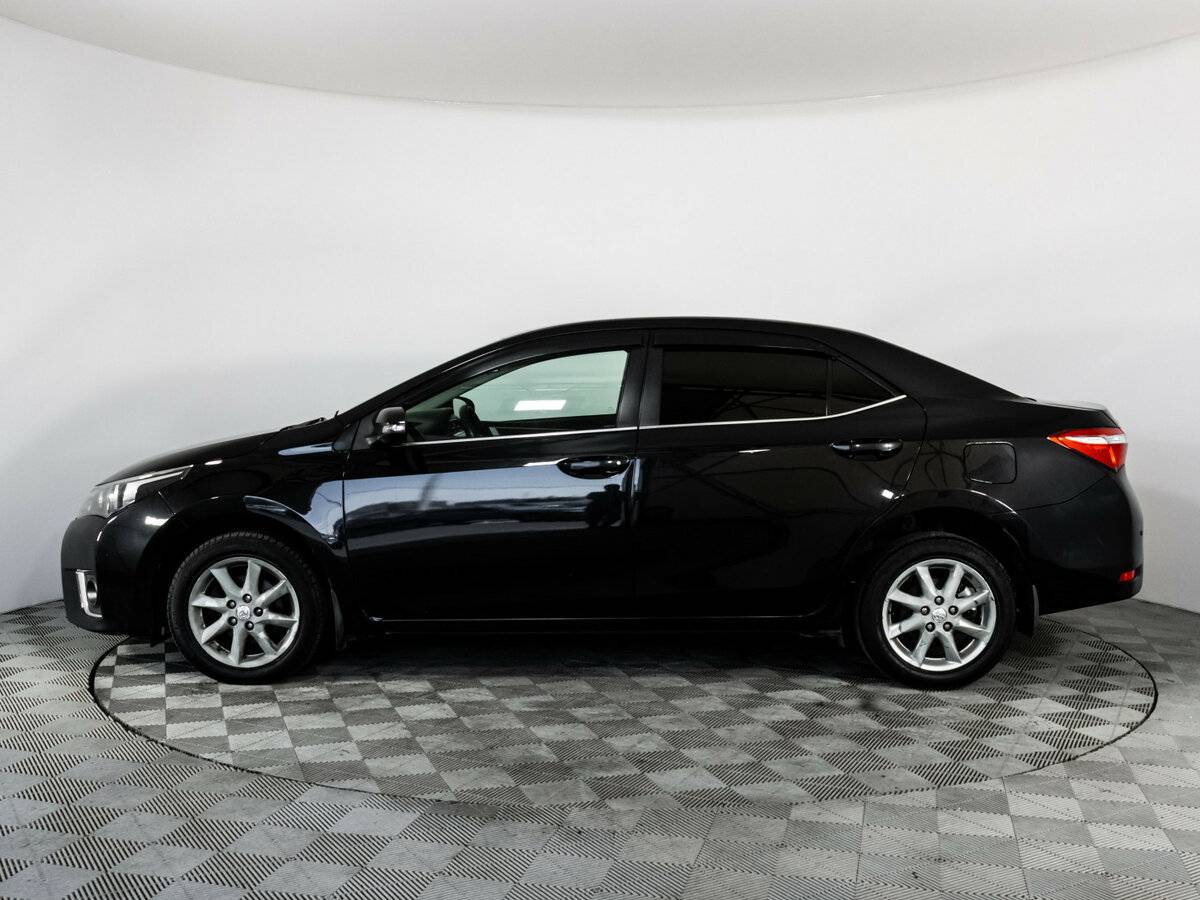 Toyota Corolla с пробегом — 2013 год. Фото: #7