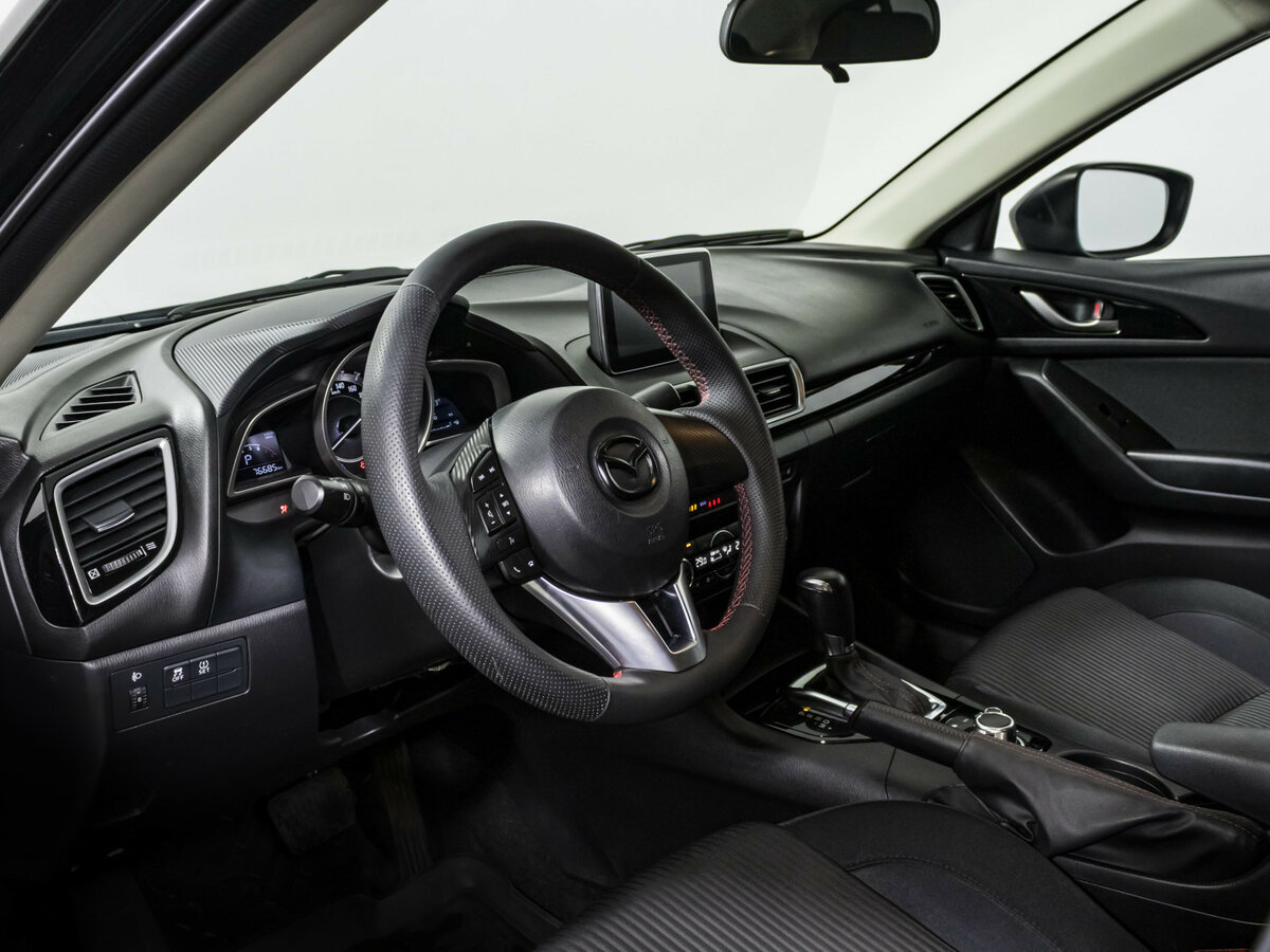 Mazda 3 с пробегом — 2015 год. Фото: #7