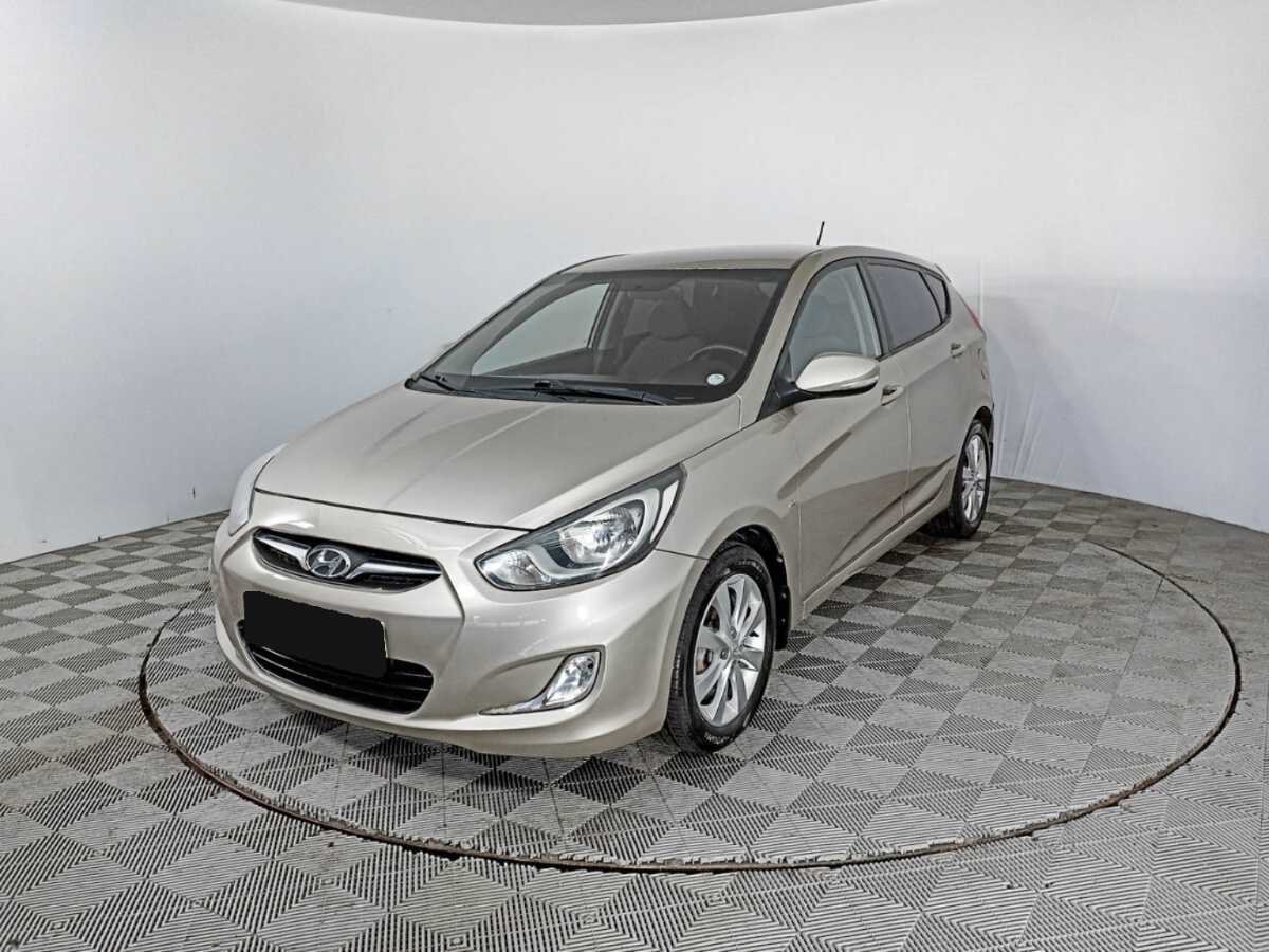 Hyundai Solaris с пробегом — 2012 год. Фото: #0