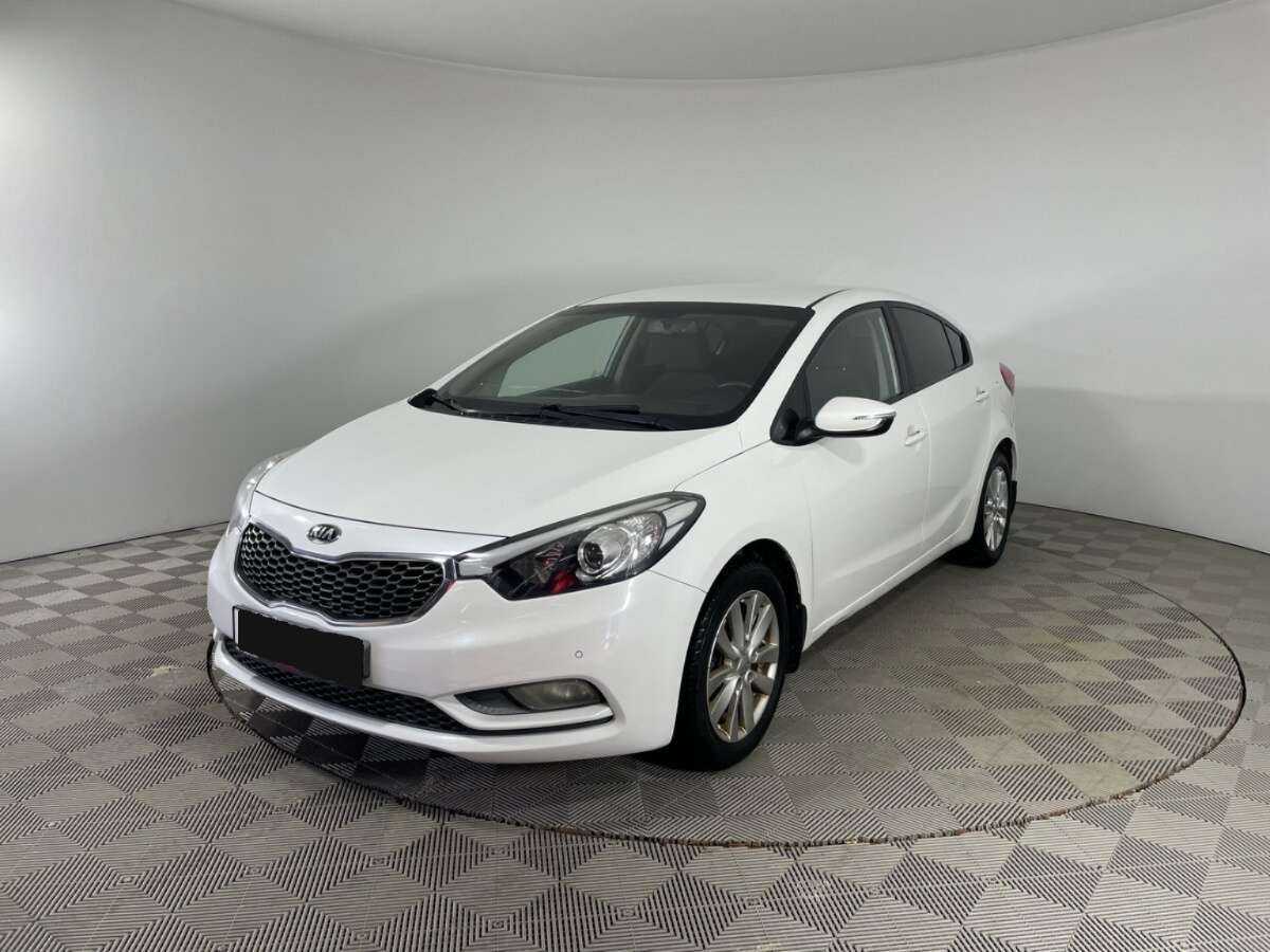Kia Cerato с пробегом — 2014 год. Посмотреть фото