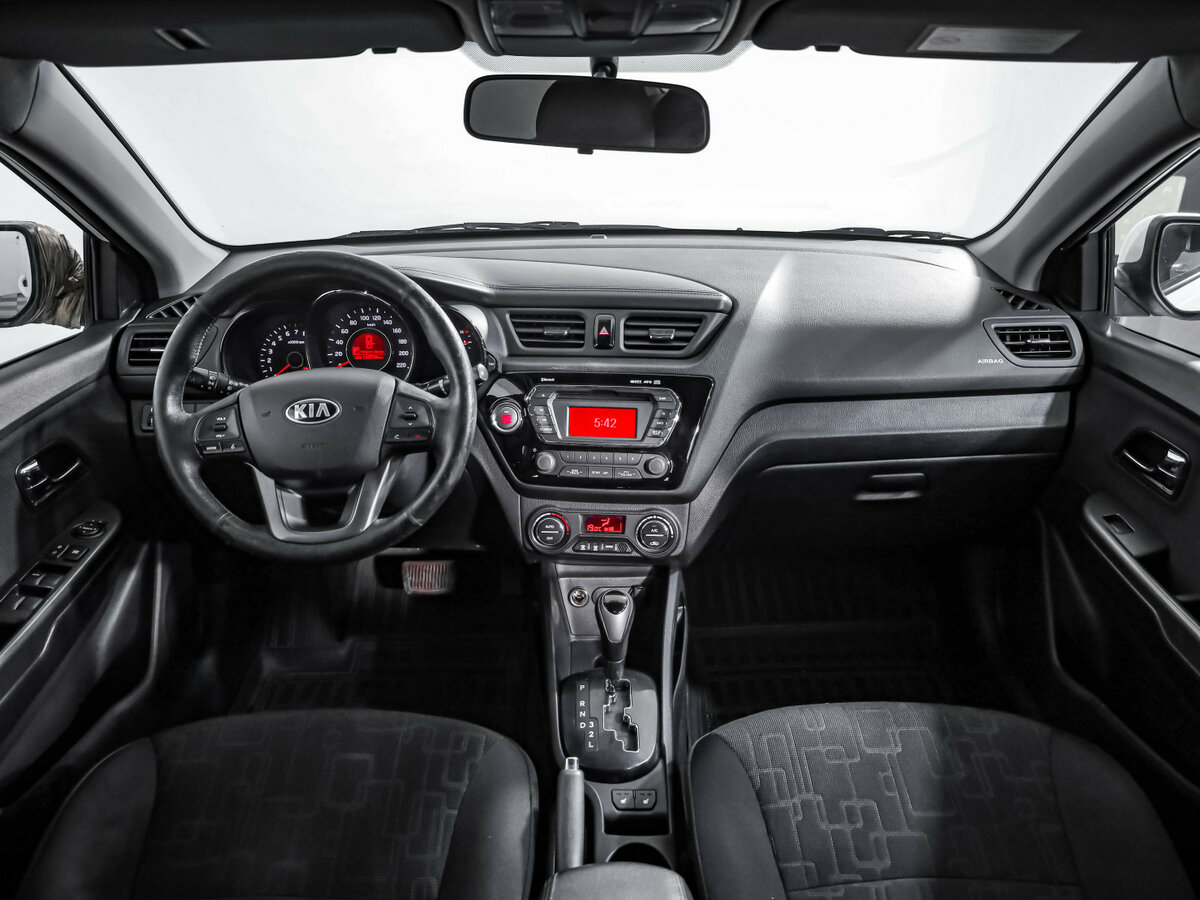 Kia Rio с пробегом — 2013 год. Фото: #6