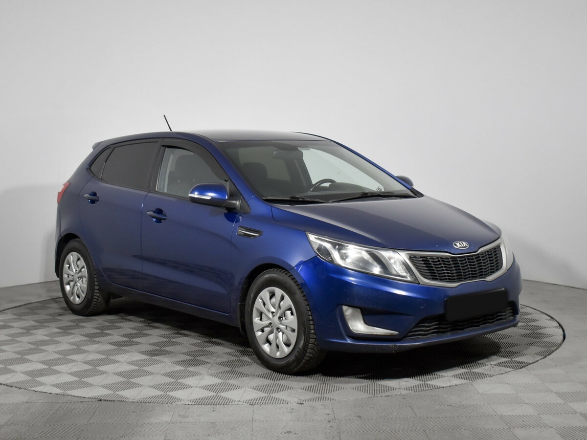 Kia Rio с пробегом — 2014 год. Фото: #2