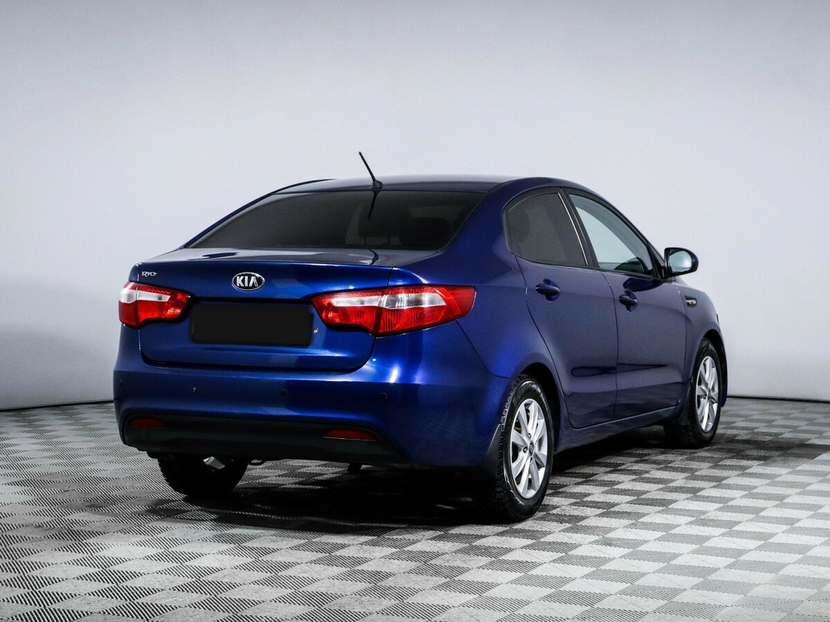 Kia Rio с пробегом — 2015 год. Фото: #2