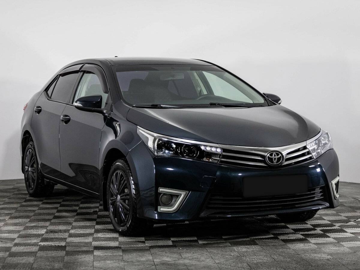 Toyota Corolla с пробегом — 2014 год. Фото: #2