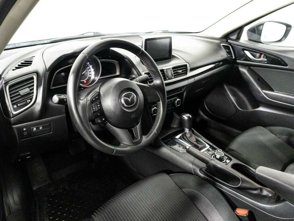 Mazda 3 с пробегом — 2013 год. Фото: #10
