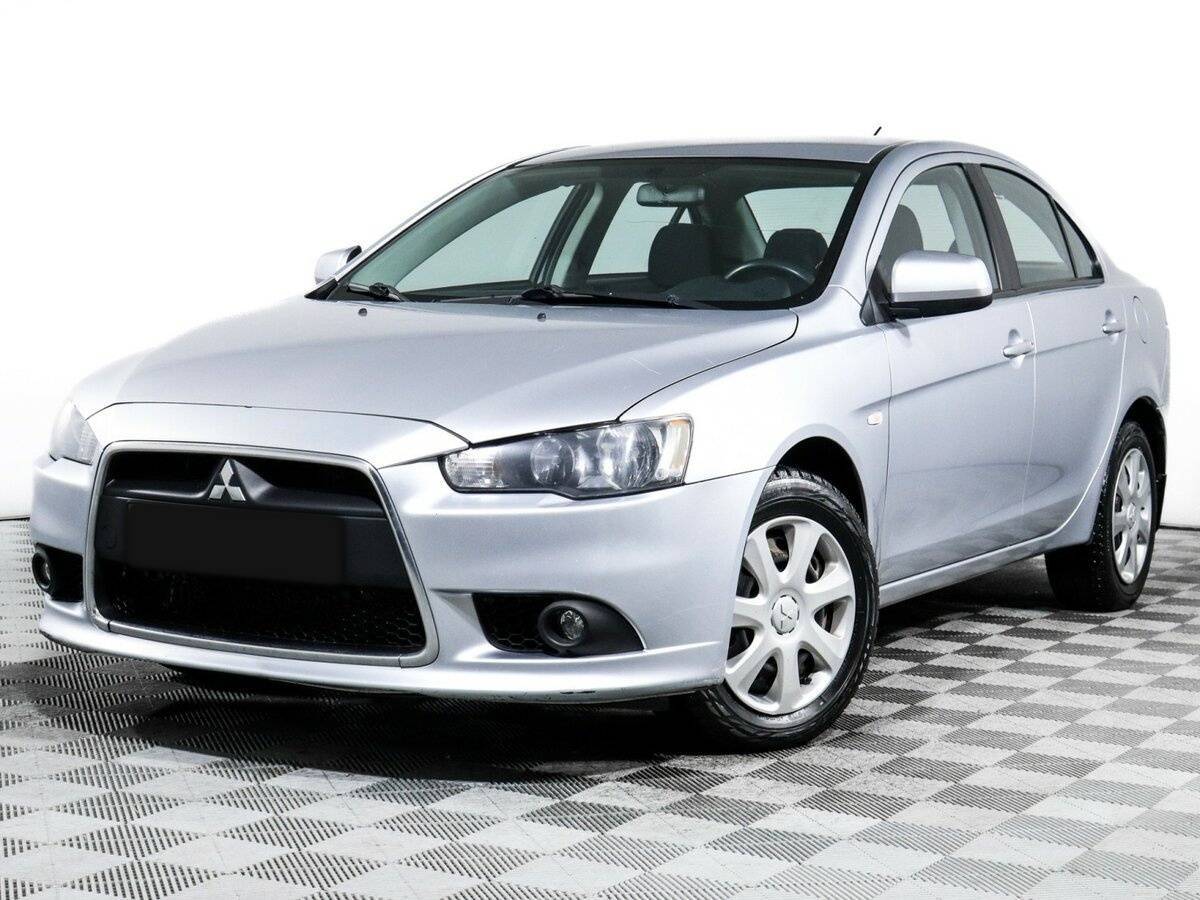 Mitsubishi Lancer с пробегом — 2014 год. Посмотреть фото