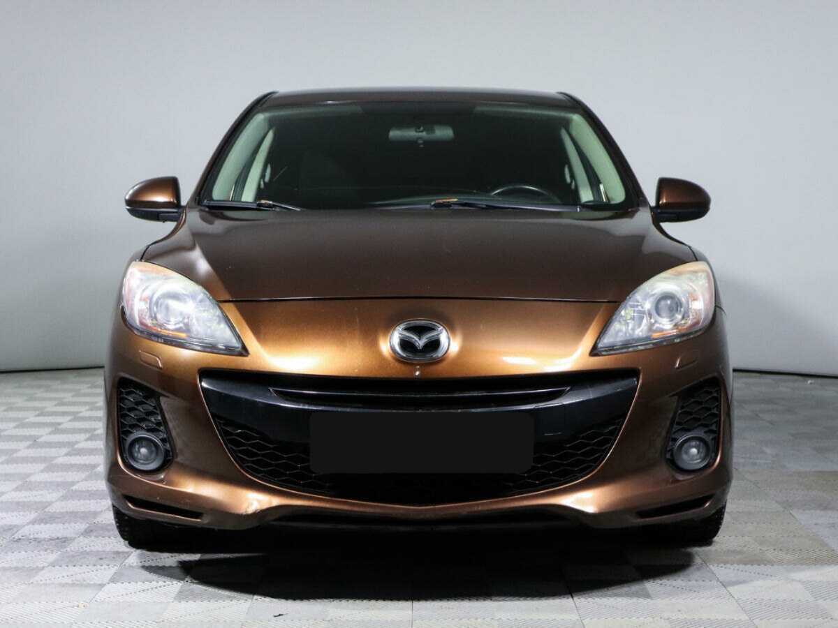 Mazda 3 с пробегом — 2012 год. Фото: #1