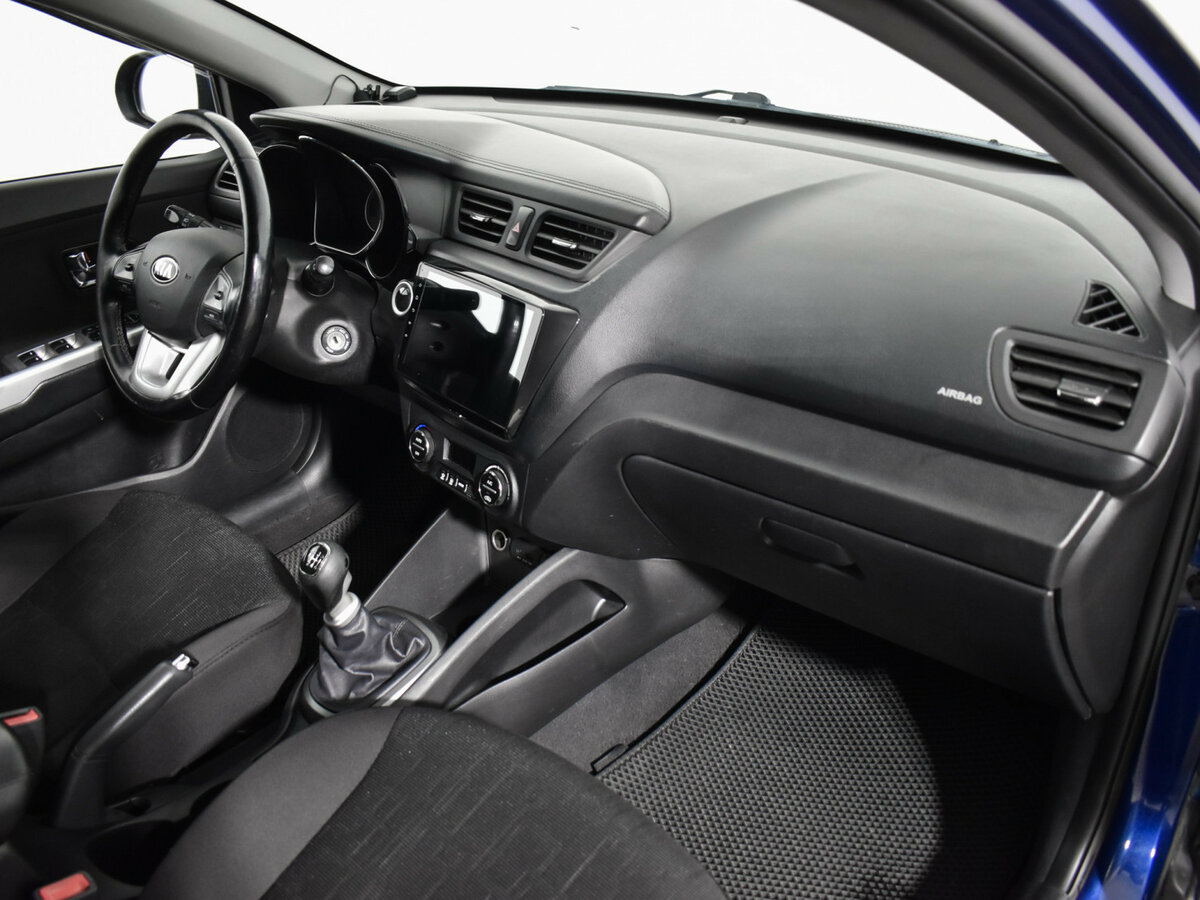 Kia Rio с пробегом — 2014 год. Фото: #11