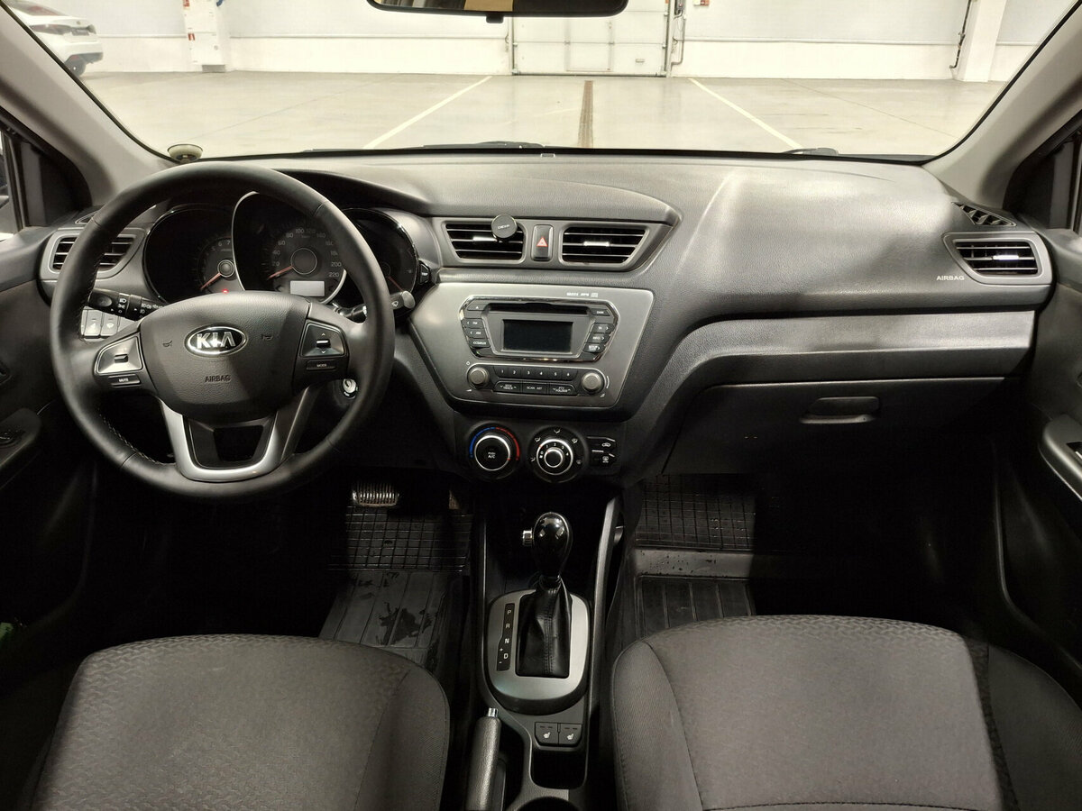 Kia Rio с пробегом — 2014 год. Фото: #12