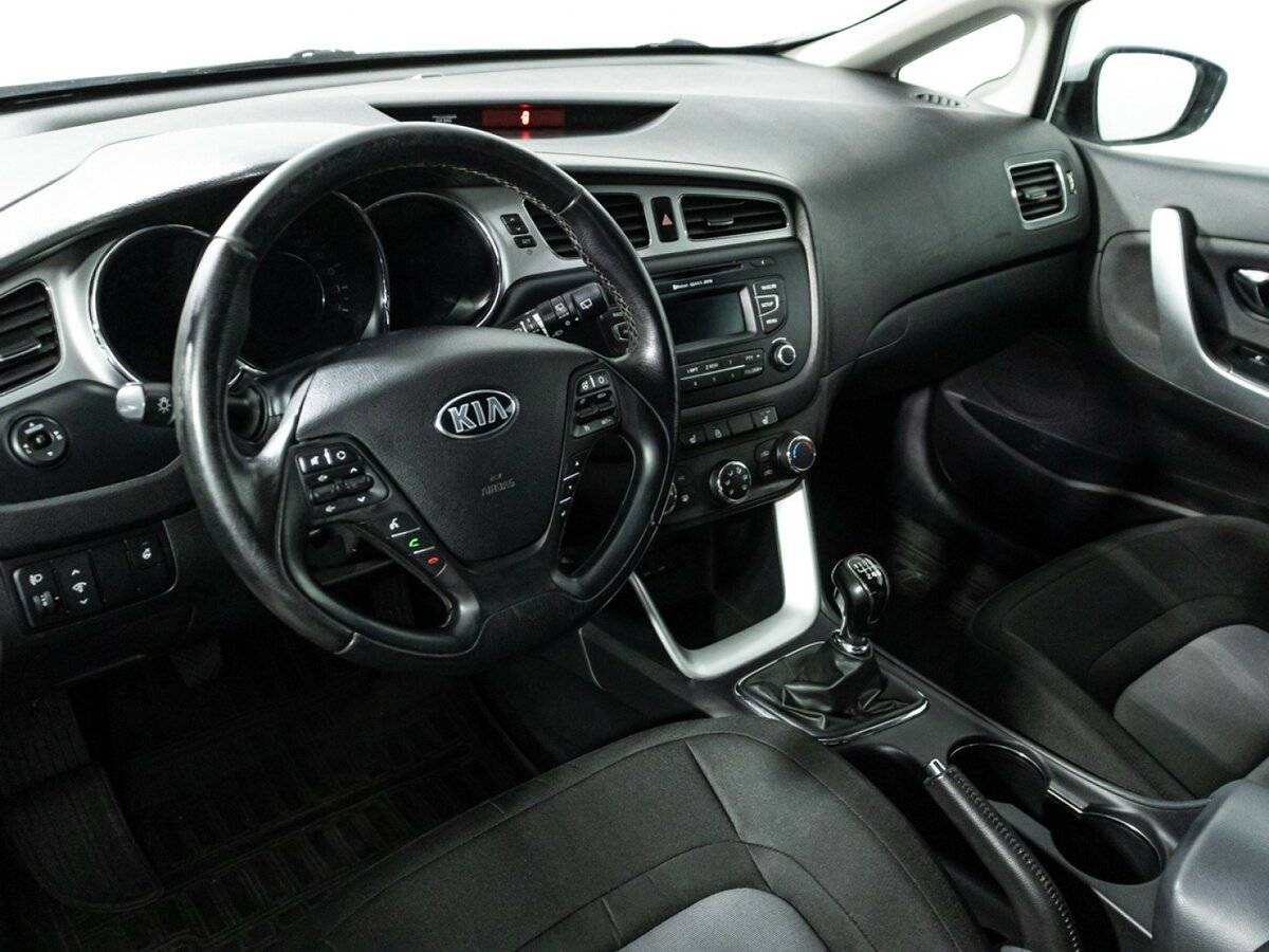 Kia Ceed с пробегом — 2013 год. Фото: #10