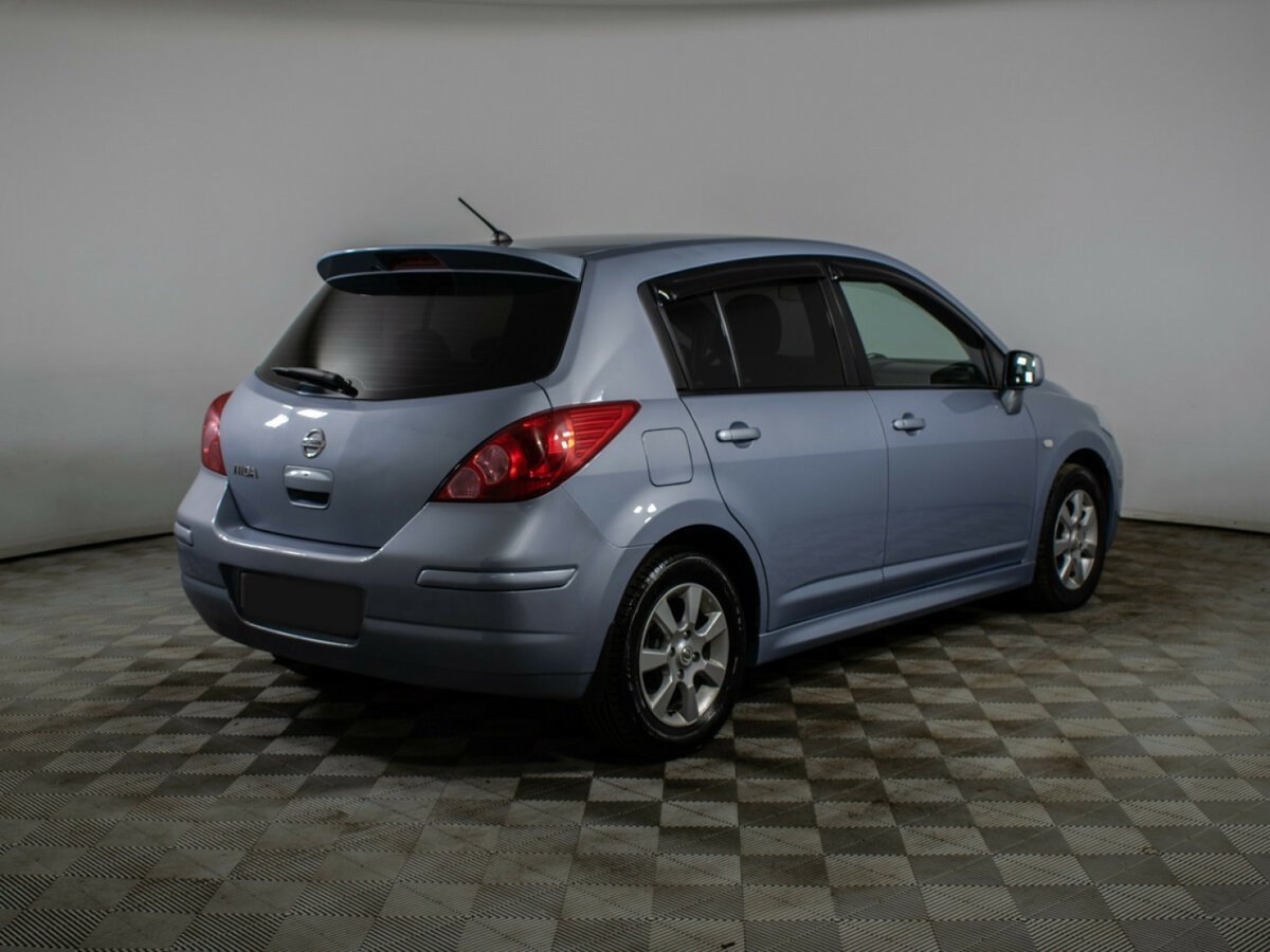 Nissan Tiida с пробегом — 2013 год. Фото: #4