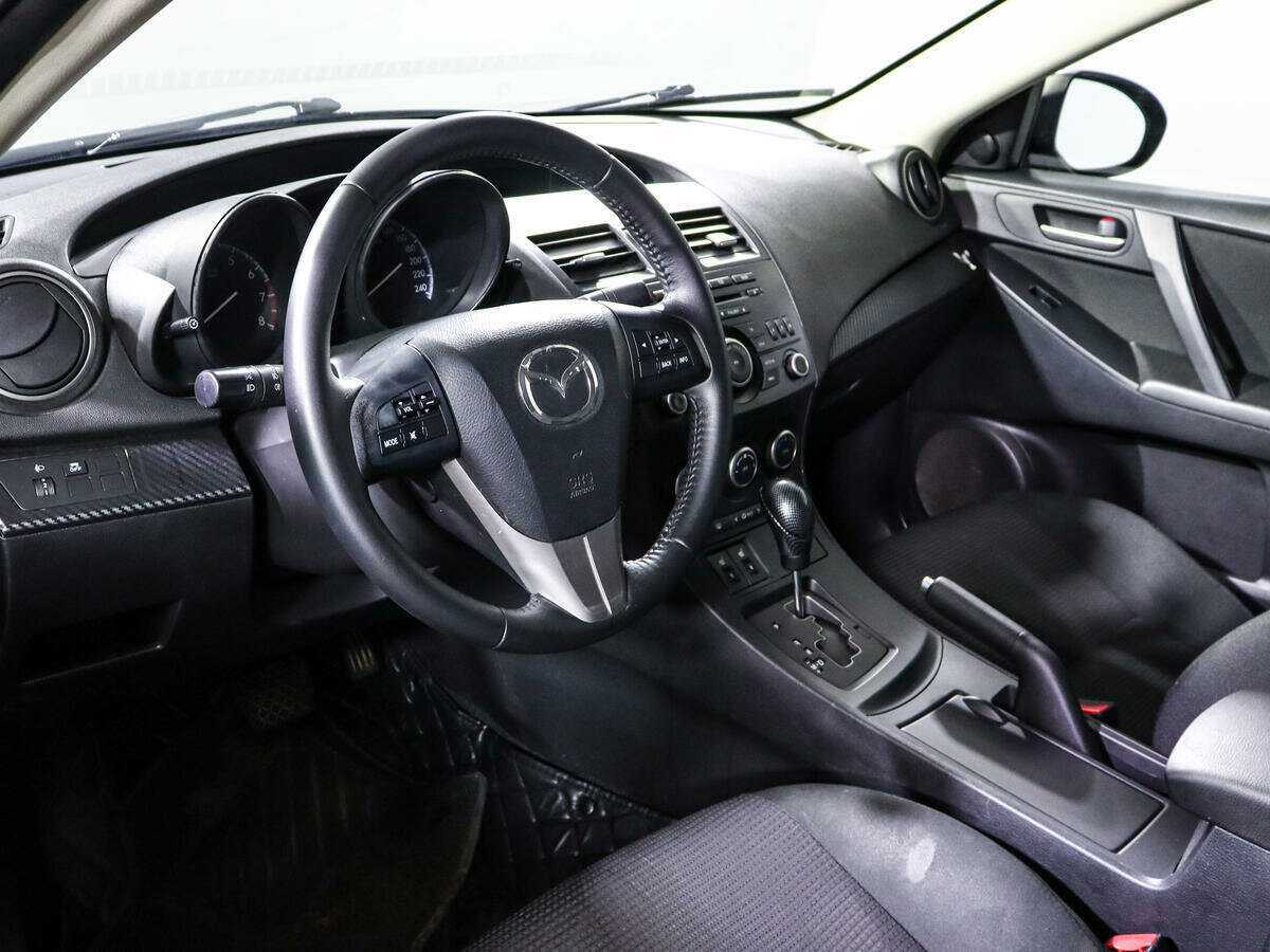 Mazda 3 с пробегом — 2012 год. Фото: #11