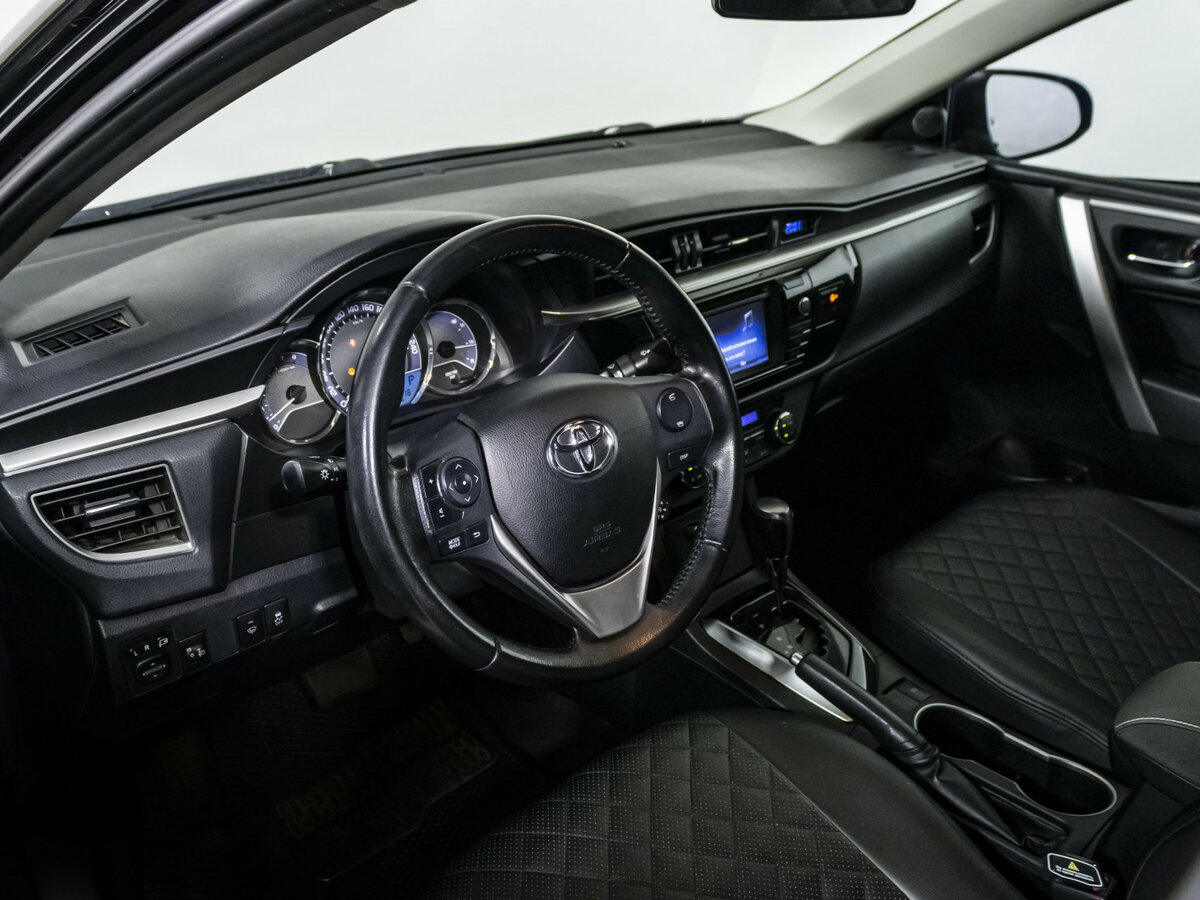 Toyota Corolla с пробегом — 2013 год. Фото: #8
