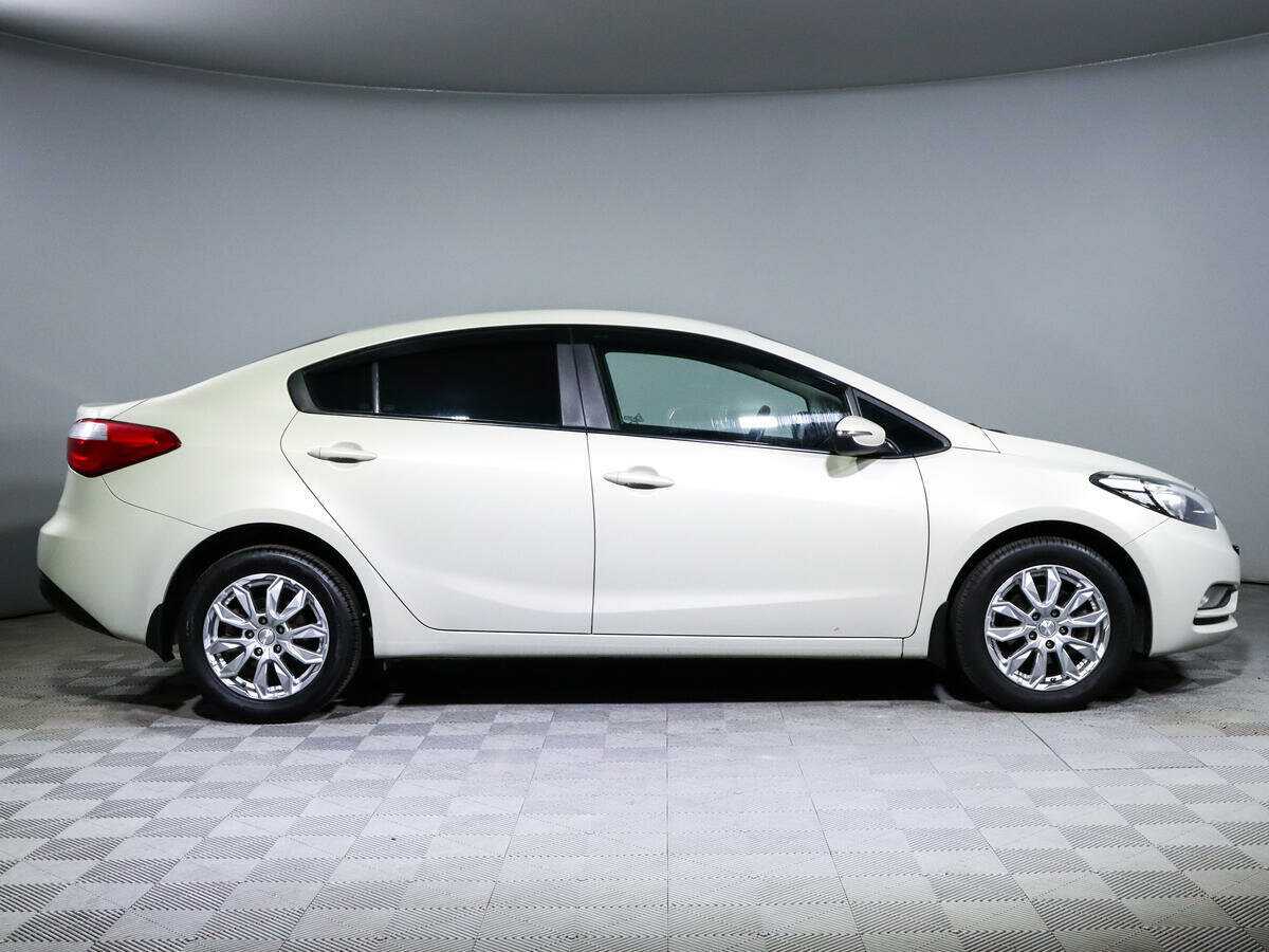 Kia Cerato с пробегом — 2014 год. Фото: #3