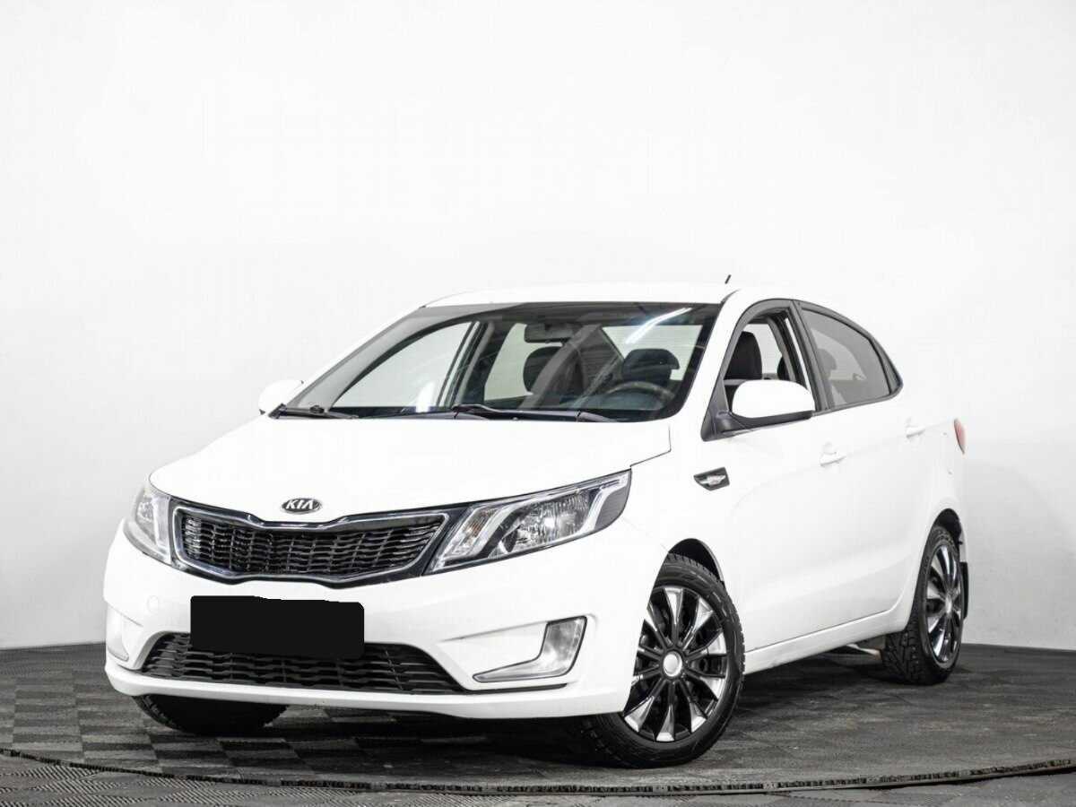 Kia Rio с пробегом — 2013 год. Фото: #0