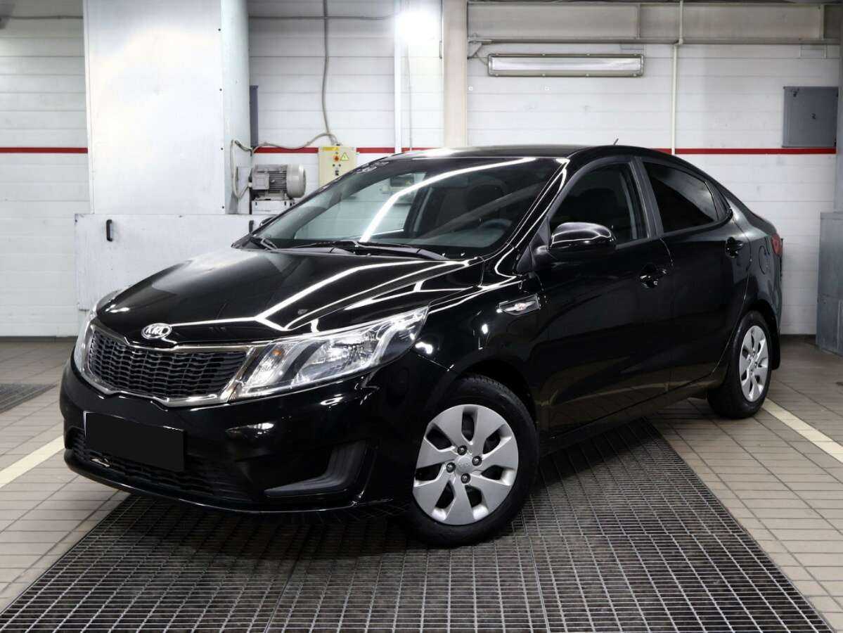 Kia Rio с пробегом — 2013 год. Фото: #0