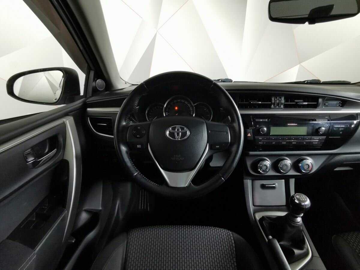 Toyota Corolla с пробегом — 2013 год. Фото: #14