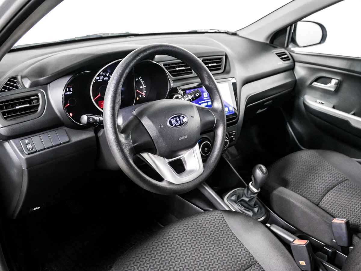 Kia Rio с пробегом — 2014 год. Фото: #12