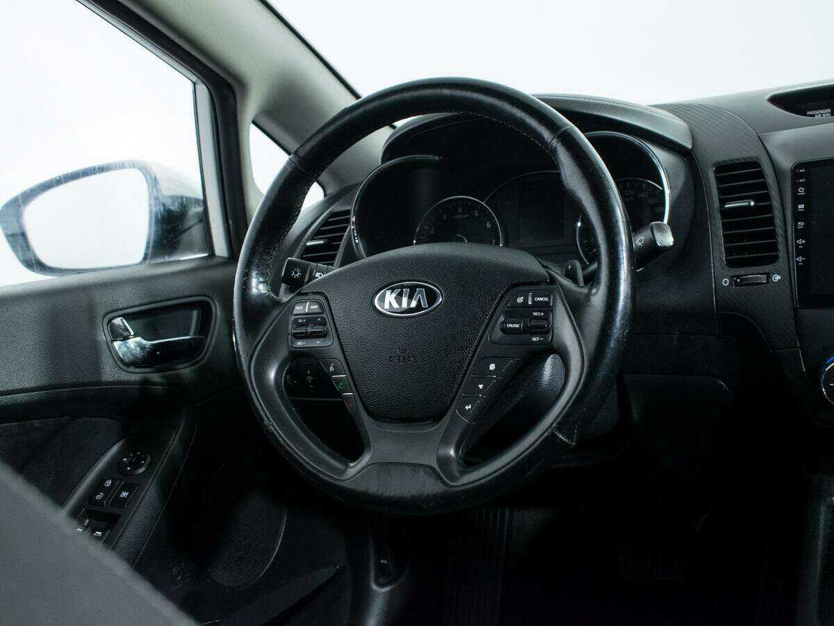 Kia Cerato с пробегом — 2015 год. Фото: #13
