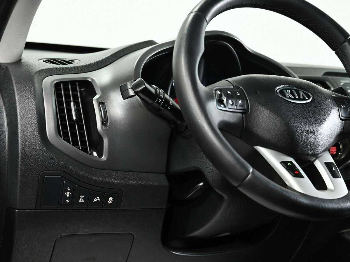Kia Sportage с пробегом — 2012 год. Фото: #7