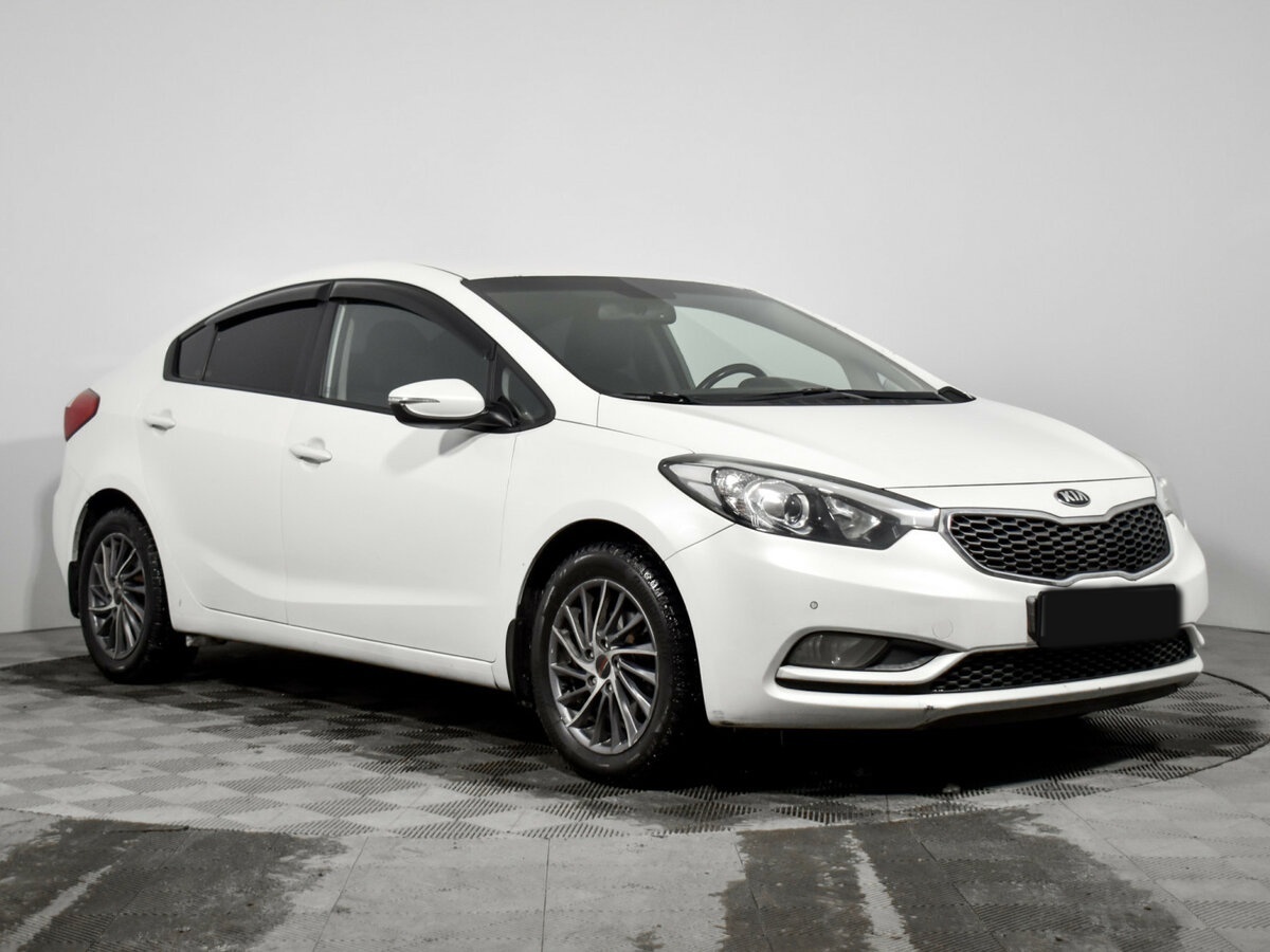 Kia Cerato с пробегом — 2015 год. Фото: #2